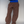 Charger l&#39;image dans la galerie, woman standing against beige backdrop wearing a large brown fleece sweater and brown straight-leg, low-rise fleece sweatpants. paired with black sneakers. Long brown straight hair and fair skin. 
