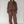 Charger l&#39;image dans la galerie, Woman standing in front of a grey backdrop, wearing a brown oversized large fleece sweater, and brown fleece pants. The outfit is a unisex style, paired with black sneakers. She has long brown hair and fair skin.
